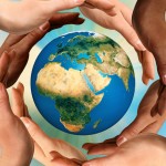 Multiracial Hands Surrounding the Earth Globe